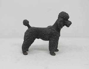 lot 77 image: Pair of black poodles one ceramic by Sadek one Onyx   made in Mexico