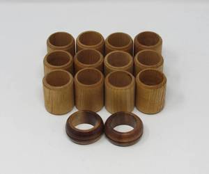 lot 140 image: 12 Wooden napkin rings and basket MCM
