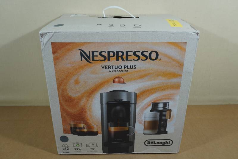 Sold at Auction: An espresso capsule coffee machine with milk