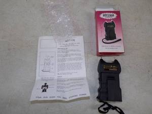 New in Box Muscle Man 120,000 Volt Taser