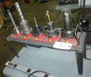 FIVE CAT50 tool holders, collets, tooling and stand
