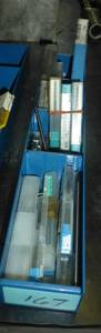 Bin of drills, end mills, etc