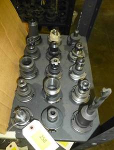 Fifteen CAT40 tool holders, chuck collets, tooling