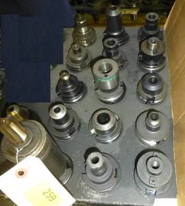 Fifteen CAT40 tool holders, chuck collets, tooling