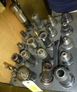 Twenty CAT40 tool holders, chuck collets, tooling