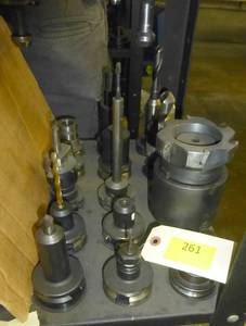 Fifteen CAT40 tool holders, chuck collets, tooling
