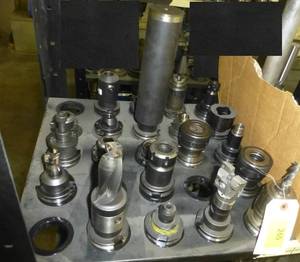 Twenty-One CAT40 tool holders, chuck collets, tooling