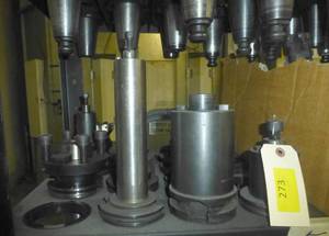 Fourteen CAT50 tool holders, chuck collets, tooling