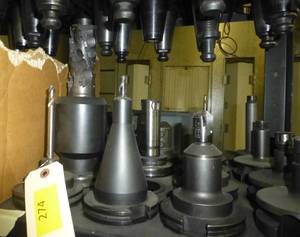 Fifteen CAT50 tool holders, chuck collets, tooling