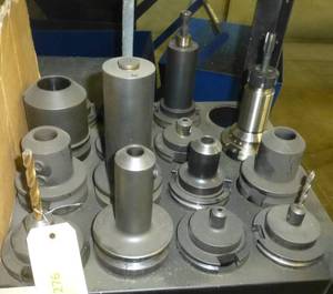 Fifteen CAT50 tool holders, chuck collets, tooling