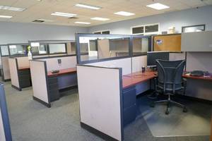 SIX LaCasse brand Nvision cubicles in the center of the room