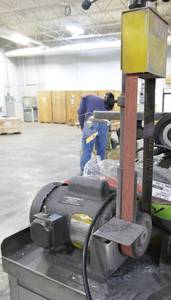 desktop belt sander w a bunch of new belts