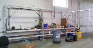 3 sections of pallet racking, against the wall, 32 in wide x 10 ft tall