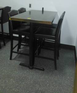 Nice condition counter height table (30x48x42) and 4 chairs