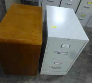 2 file cabinets, one wood and one metal