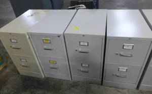 Four 2-drawer file cabinets