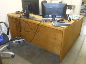 L-shaped desk, no contents