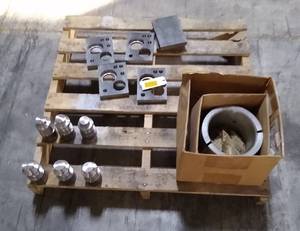 pallet of misc parts and steel blocks