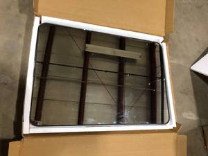 lot 34 image: XRAMFY 26 in. W x 38 in. H Rectangular Aluminum Alloy Framed Rounded Black Wall Mirror Customer Returns See Pictures