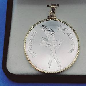 lot 6 image: Palladium 1 troy oz. 1989 USSR Russia Ballerina Uncirculated 25 Rouble Coin & 14K Bezel  w COA