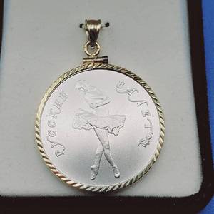 lot 7 image: 1990 � troy oz .999 Palladium 10 Rubles Ballerina Coin in 14k Gold Bezel w COA