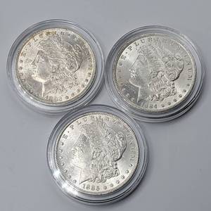 lot 14 image: 3 Morgan Silver Dollars 1883-O, 1884-O & 1885-O, All Higher Grade in Capsules