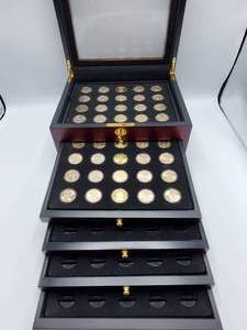 lot 75 image: 40 Presidential Dollars in Wood Display Case with Key