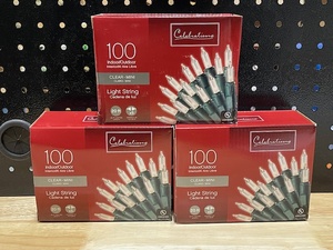 lot 32 image: Clear Mini Christmas Light String 3 Boxes of 100