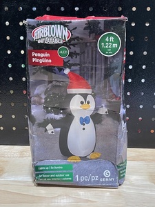 lot 34 image: 4 Foot Inflatable Penguin LED