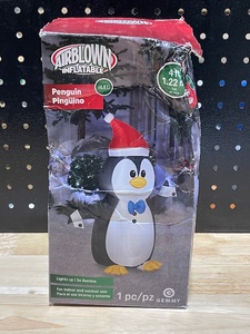 lot 35 image: 4 Foot Inflatable Penguin LED