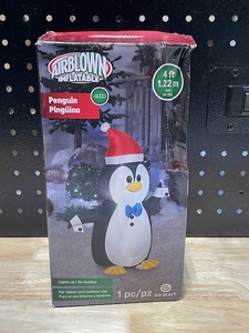 lot 36 image: 4 Foot Inflatable Penguin LED