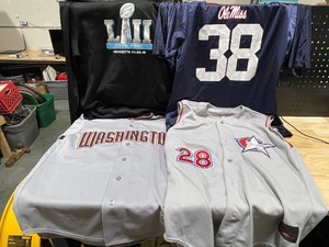 lot 49 image: Sports Teams Jerseys and Superbowl Hoodie
