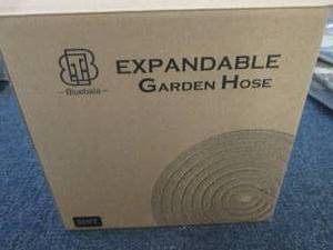 lot 43 image: 50 ft Expandable Garden Hose...