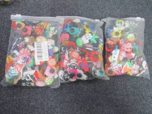 lot 55 image: 3- 100ct Pks Shoe Charms...