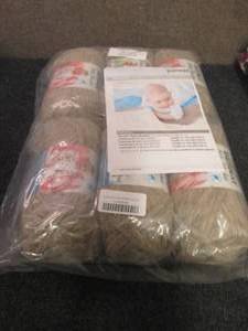 lot 59 image: 6 Skeins Tan Baby Blanket Yarn...