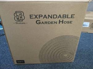 lot 89 image: 50 ft Expandable Garden Hose...