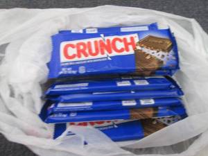 lot 284 image: 12- 1.55 oz Crunch Bars...