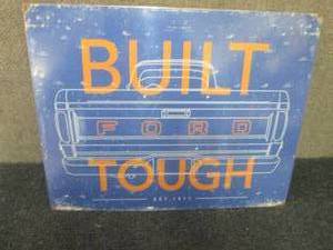 lot 396 image: Built Ford Tough Metal Sign 16x12.5...