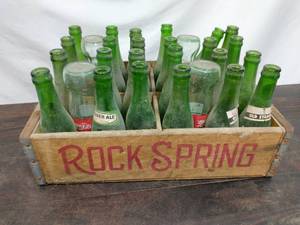 lot 12 image: Rock Spring Crate with Glass Bottles
