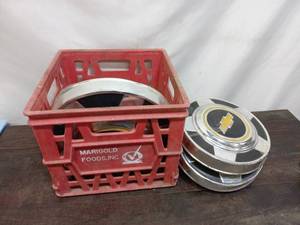lot 36 image: Collection of 8 Chevy Hub Caps