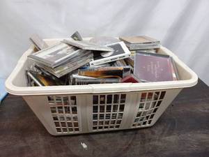 lot 39 image: Laundry Basket Full of CDs