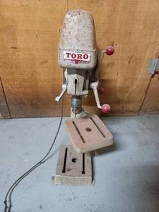 lot 65 image: Toro Drill Press