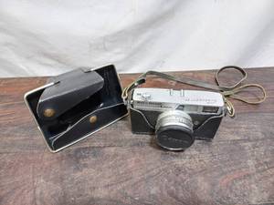 lot 105 image: Vintage Bell And Howell  Canon Canonet 19 Camera