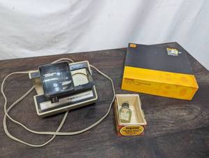 lot 215 image: Slide Projector, Slide Tray, And Reel Oil