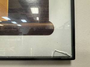 lot 27 image: Hamms Beer Framed Ad - Happy Holiday Bear Skater