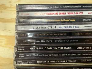 lot 69 image: Collection of CDs - Stevie Ray Vaughn, Bill Ray Sirus, Grateful Dead, Bob Dylan, Neil Young to name a few