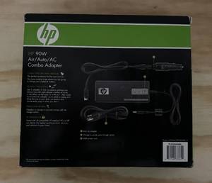 lot 104 image: HP 90 W AirAutoAc Combo Adapter - New in box