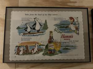 lot 135 image: Pair of Hamms Placemats - Tales from the Land of Sky Blue Waters