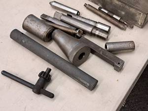 lot 526 image: Assorted Parts and Bits for Misc. Chucks and Drills with Metal Box