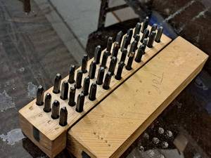 lot 591 image: Lot of (37) Punches with Storage Block Case